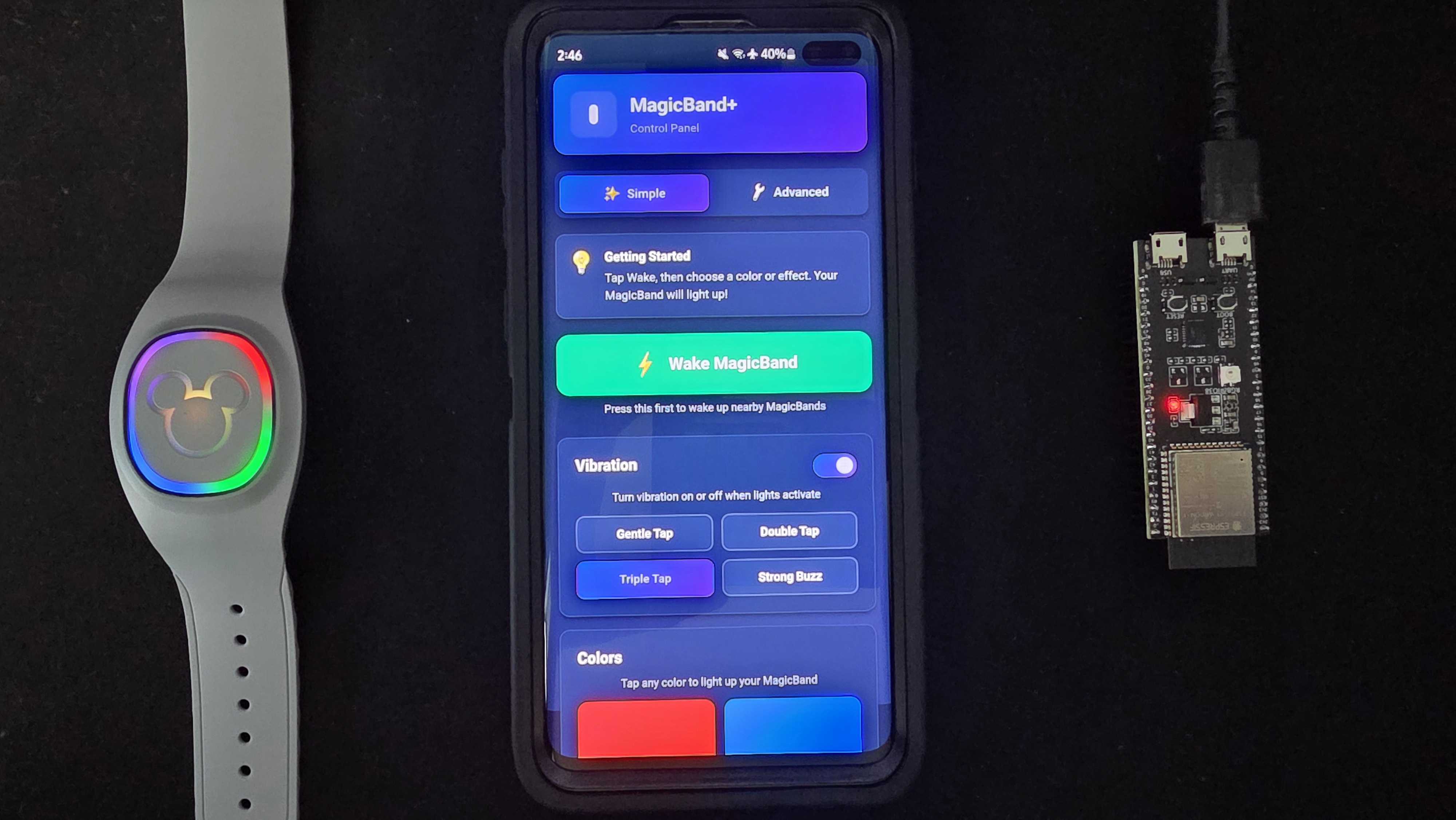 Split view showing glowing MagicBand+ and ESP32 with web interface